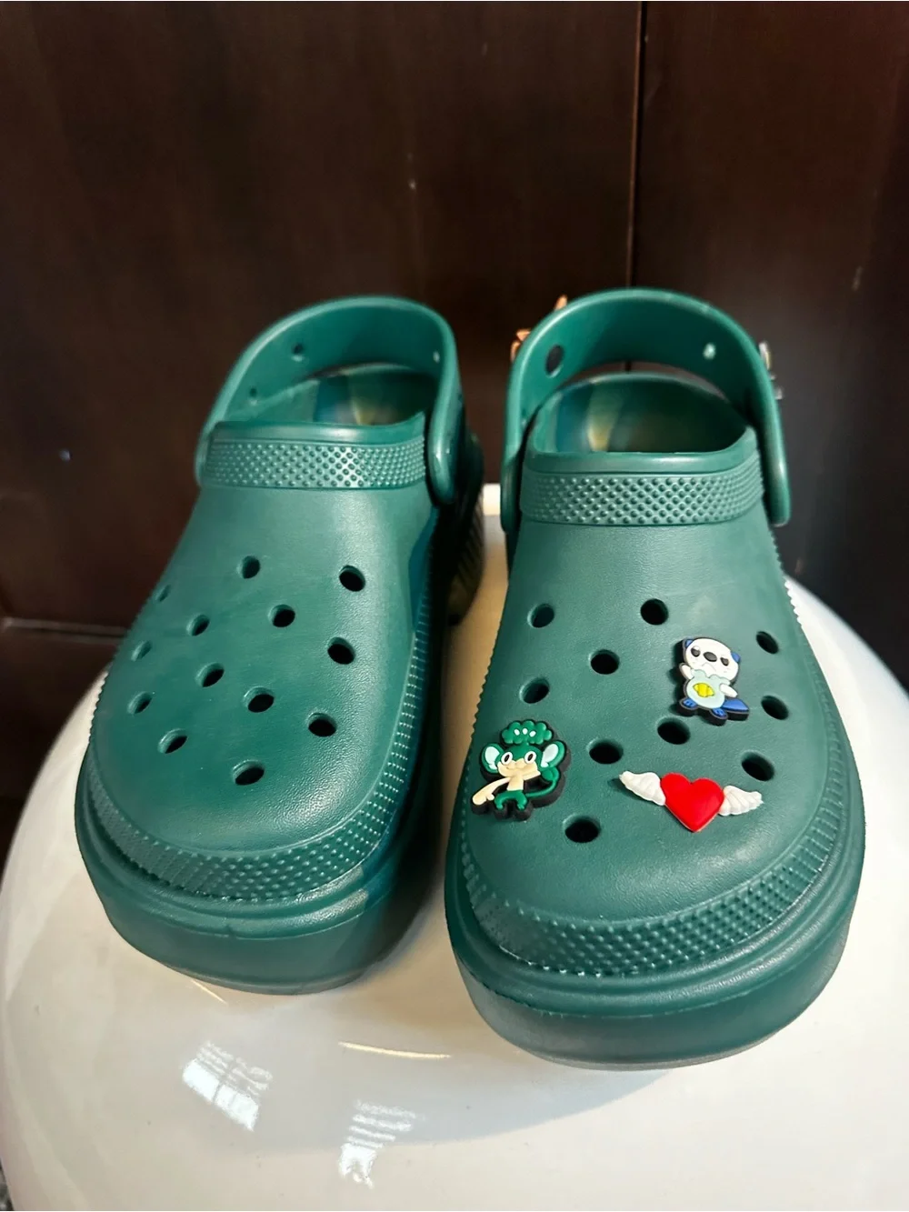 CROCS Platform Clog in Dark Green with Charms
